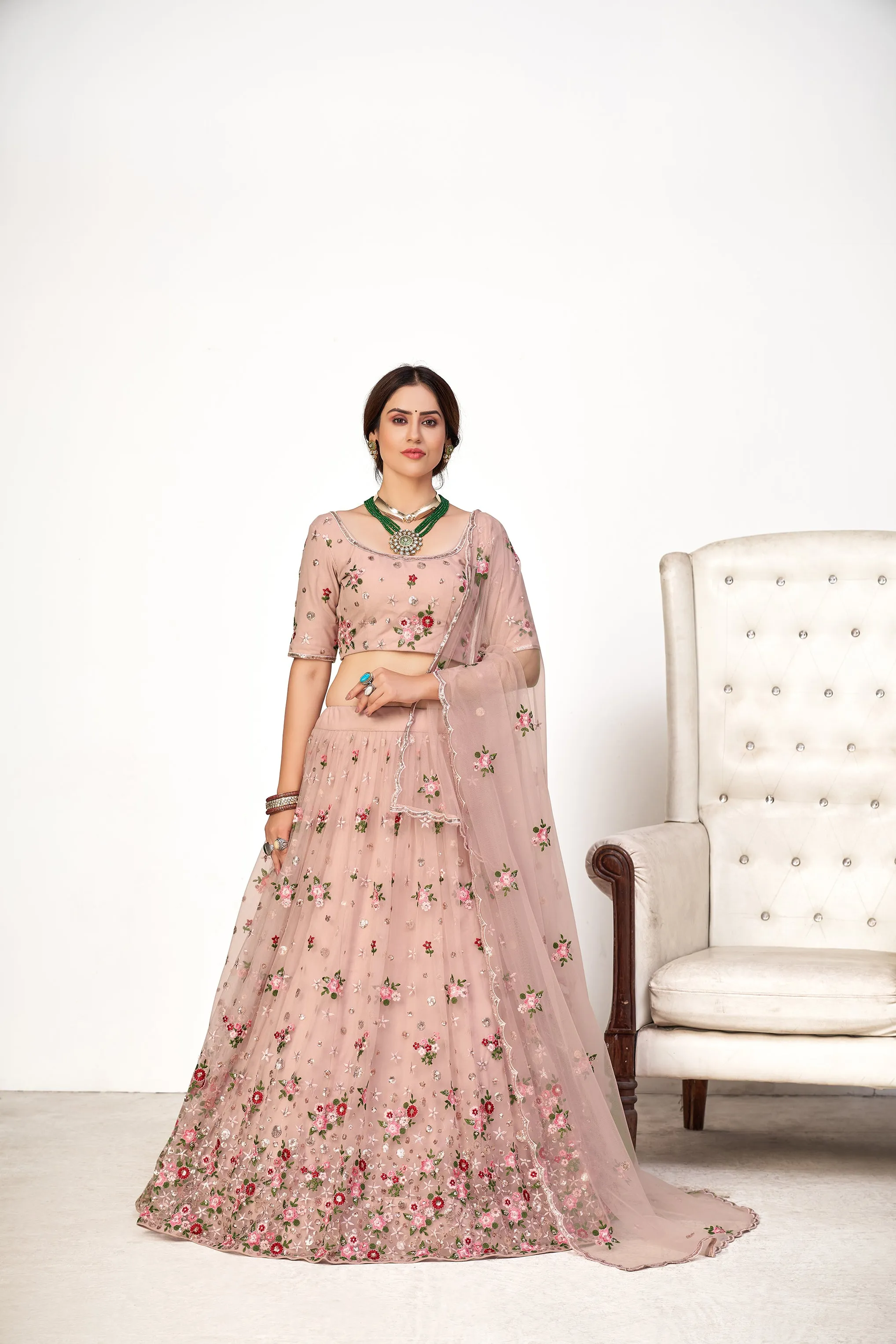 Enchanting Pink Embroidered Net Wedding Ghagra Choli With Dupatta