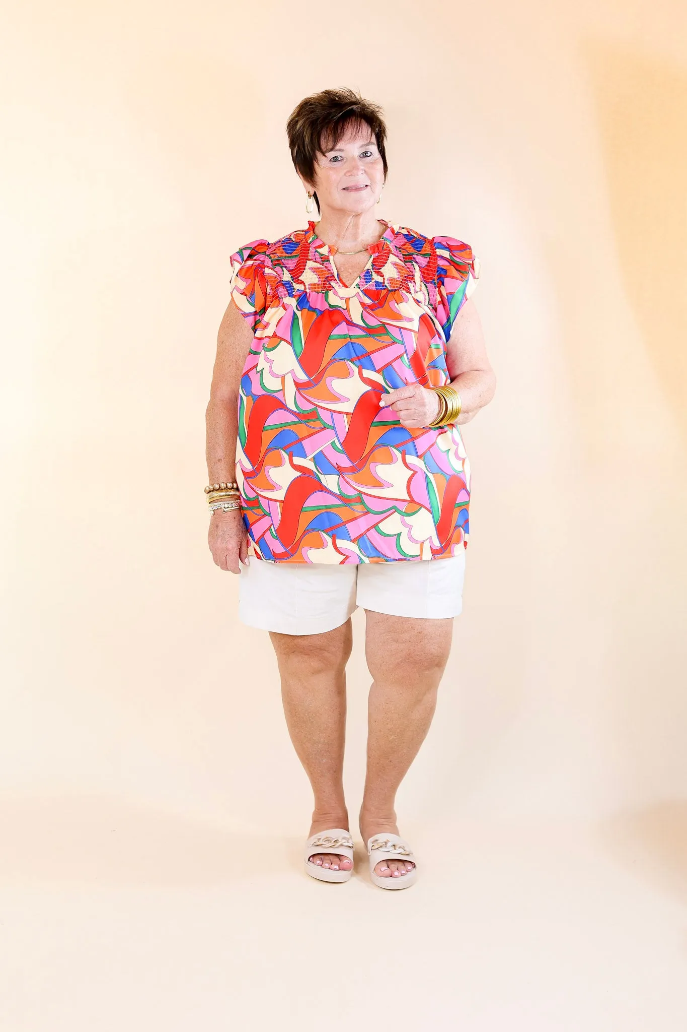 Lovely Line Up Abstract Print Top with Ruffle Cap Sleeves in Pink, Red, Blue and Cream Mix