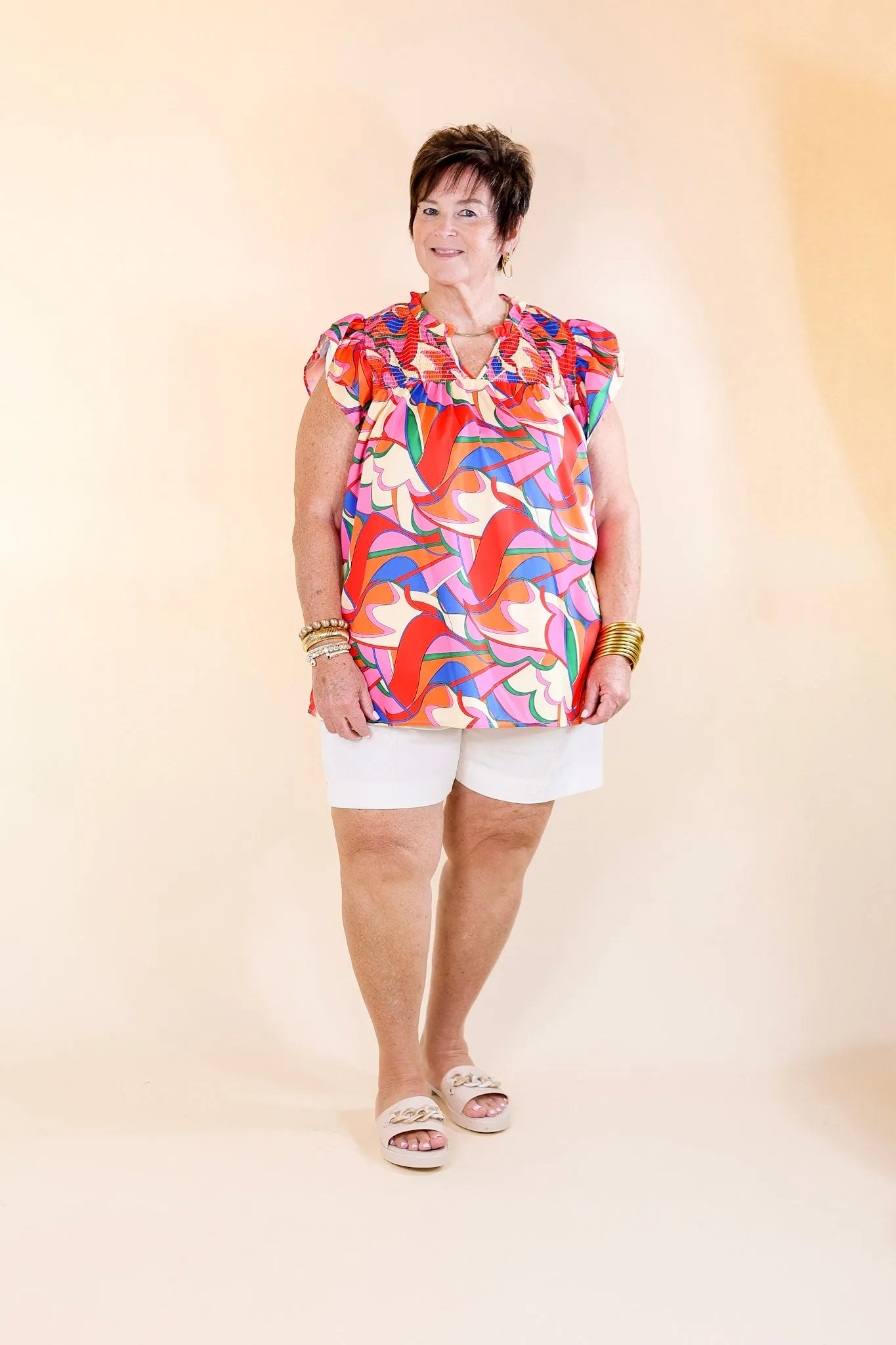 Lovely Line Up Abstract Print Top with Ruffle Cap Sleeves in Pink, Red, Blue and Cream Mix